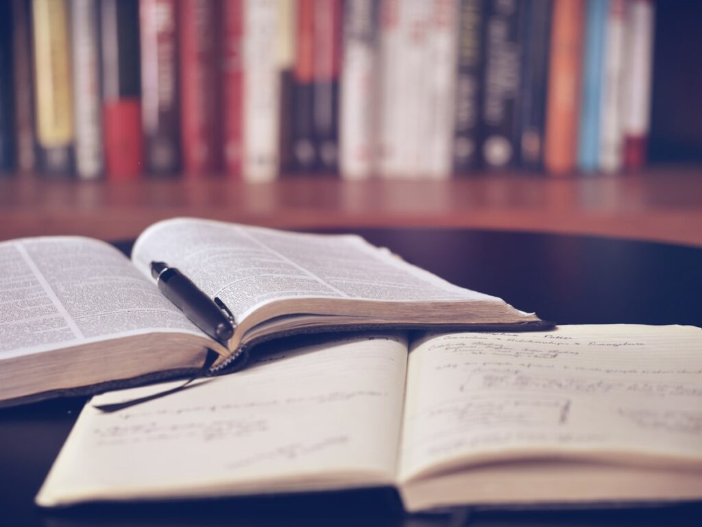 Open book with reading glasses - Quiger memory exercises